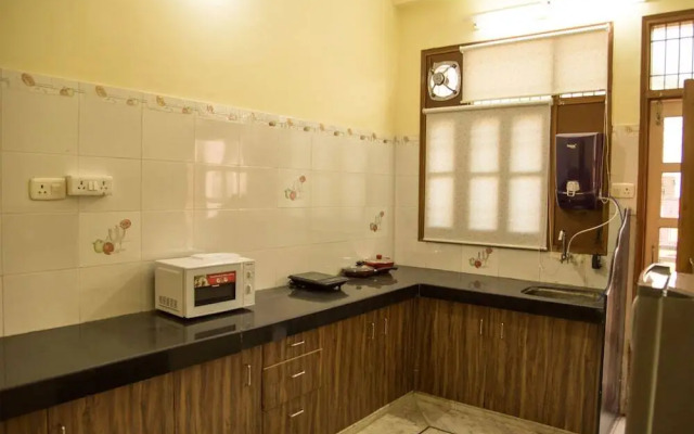 Urvi Apartments by OYO Rooms