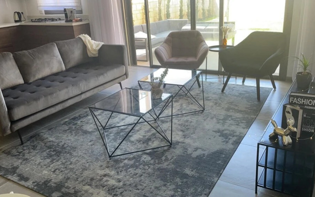 Deluxe Apartment with Private GardenArea