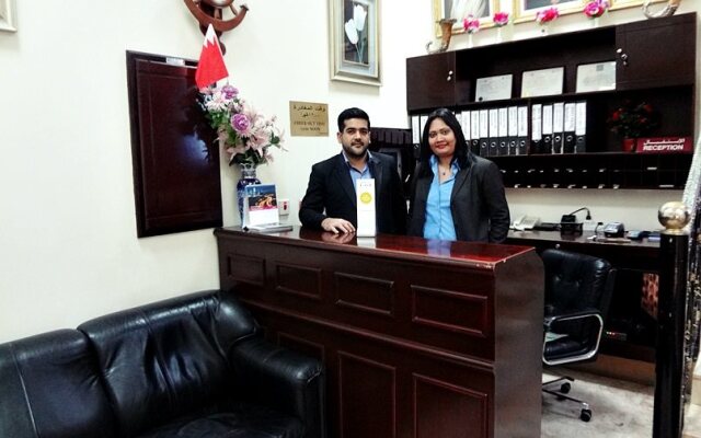 Al Commodore Suites