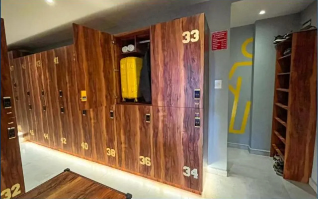 The Yellow Capsule Cancún