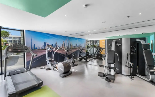 Waves - Stylish 1BR in JVC with Balcony & Pool