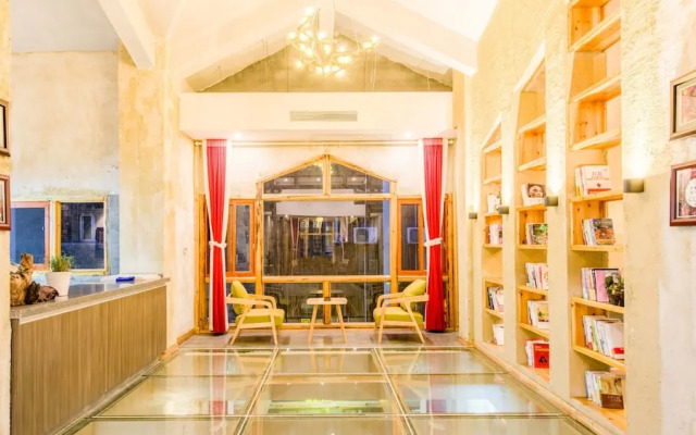 Floral Hotel Fenghuang Huercaowu