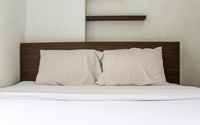 Comfortable and Tranquil 2BR Apartment at Green Pramuka By Travelio