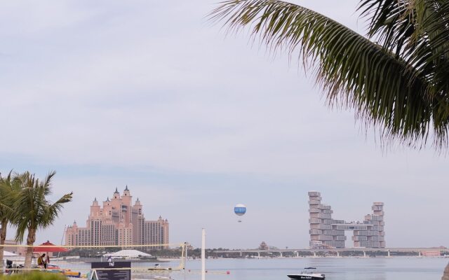 Palm Perfection 3BR with Private Beach