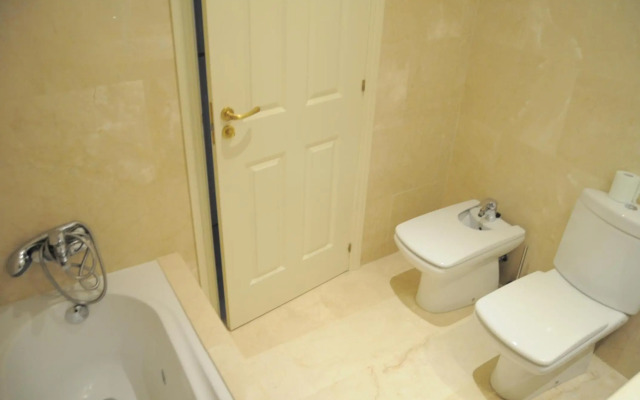 Precioso apartamento con jardín y piscina comunitaria