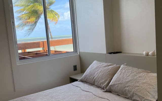 Pé na areia do Caribessa - Branco Haus