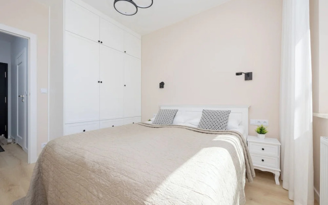 Gumińska Apartment Warsaw by Renters