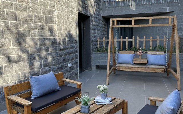Grey Escape Apartements