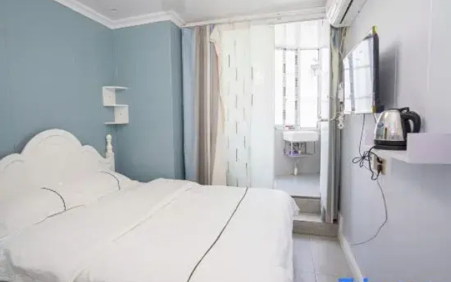 X9 E-sports Movie Homestay (Guanggu Plaza)
