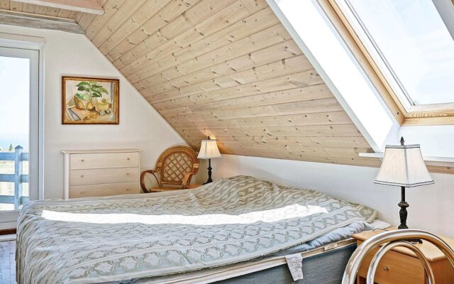 Cozy Holiday Home in Gudhjem near Golf Course