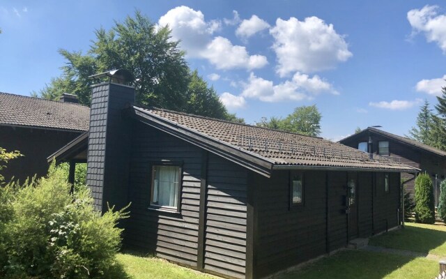 Wooden bungalow with oven, in Oberharz near a lake