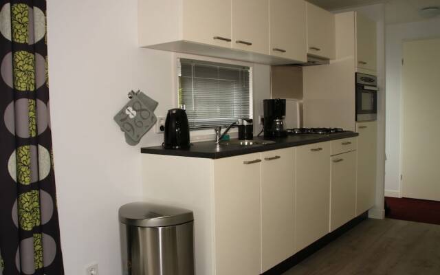 Modern chalet with two terraces and near a pond