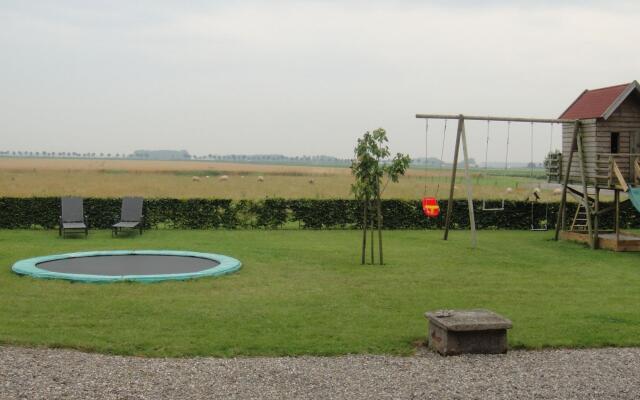 Spacious Farmhouse in IJzendijke with Garden