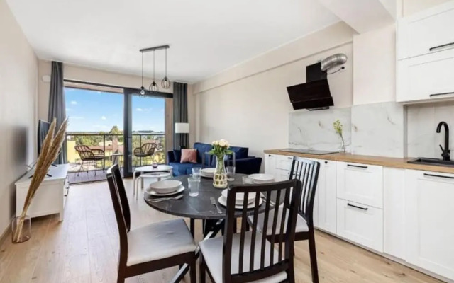 Holiday Apartment Right Next to the Beach Darlowko