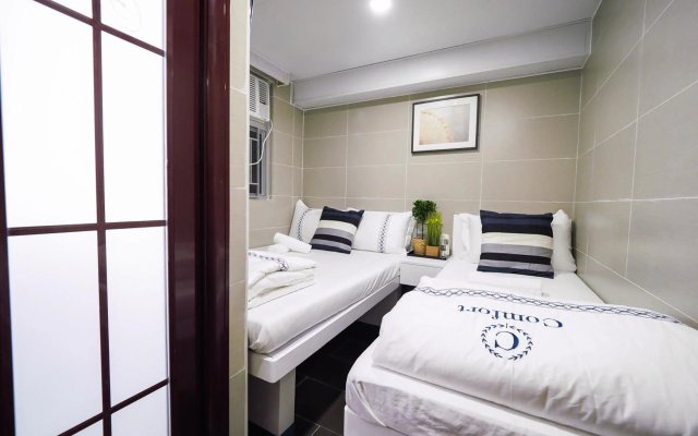 Smiley Inn – Guest Rooms – Kowloon