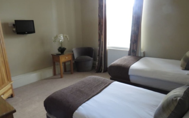 The Station Bar Grill and Rooms