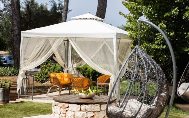 Trullo Nonna Netta con Piscina Idromassaggio e Area Giochi