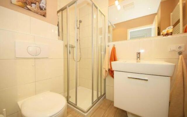 Kurparkresidenz Baabe - Ferienwohnung Meeresgarten mit Terrasse