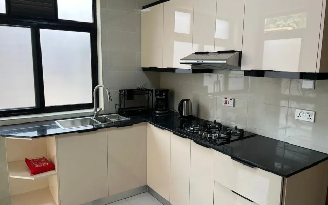 Q-Plus Apartments