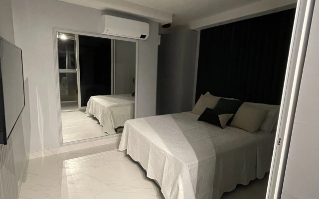 Pé na areia do Caribessa - Branco Haus