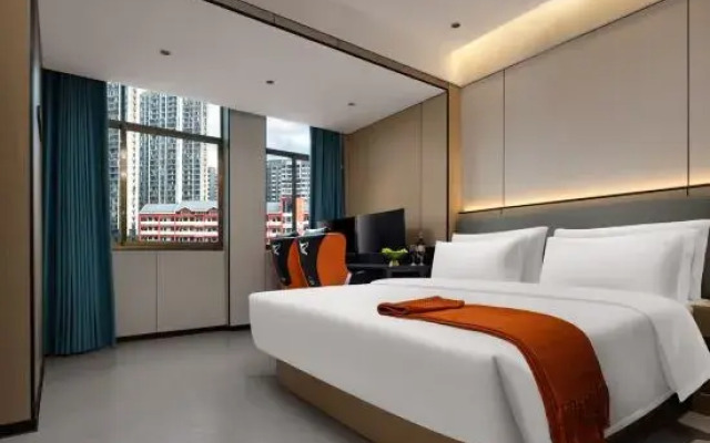 Yiyang Qianyi Hotel (North Branch of City College)