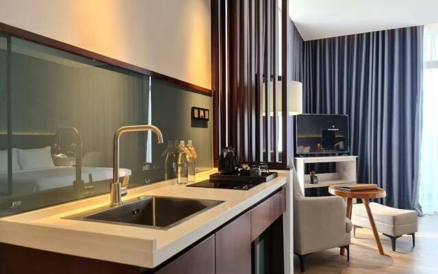 Newcc Hotel & Serviced Apartment