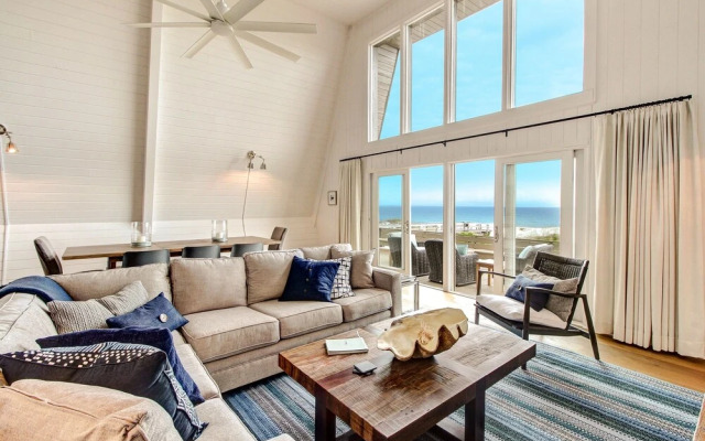 Roomy Chalet-Style Beachfront Condo with Private Beach Access by RedAwning