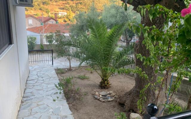Stone house under a rock Kukos