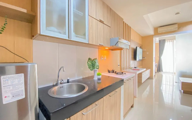 Homey and Comfortable 1BR Apartment at Dago Suites