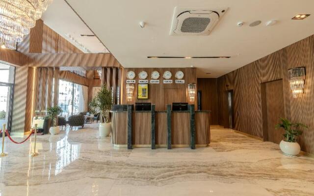 By The Marina Hotel