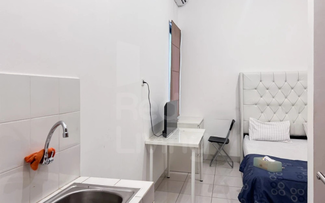 RedLiving Apartemen Eco Home - Wiegs Room Tower B Yashinoki – Guest Rooms – Tigaraksa