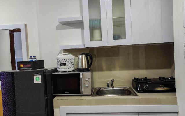 Homey and Comfy 2BR at Vida View Apartment