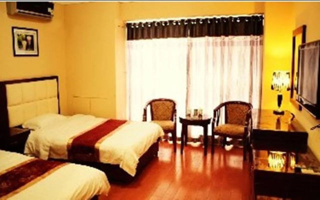 Manhattan Business Hotel Zhengzhou Shenglong Building Branch