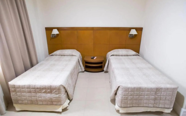 Le Village Flats e Hotel