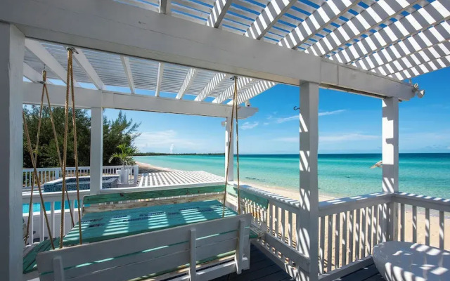 Secluded Luxury: New Beachfront Home With Pool