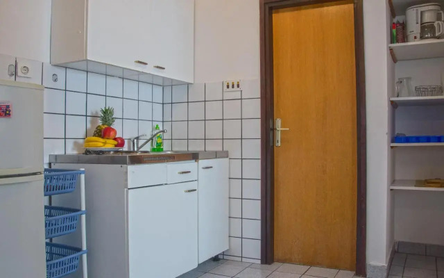 Three-Bedroom Apartment Jadranovo with an Outdoor Swimming Pool 08