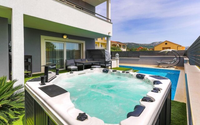Nice Home in Kastel Novi With Sauna, Wifi and 8 Bedrooms