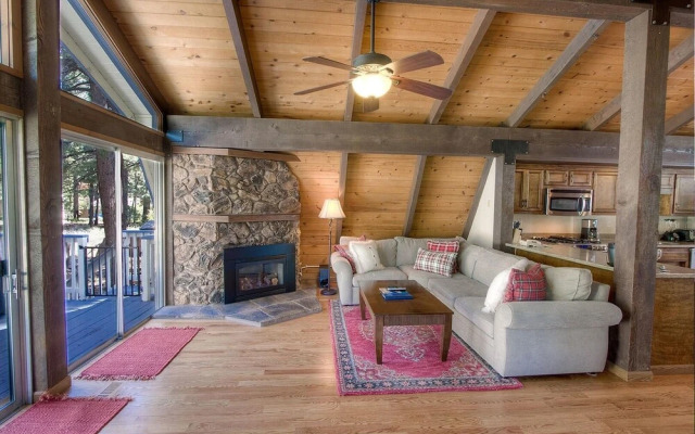 Remodeled Gambrel Style Home with Trees Views by RedAwning