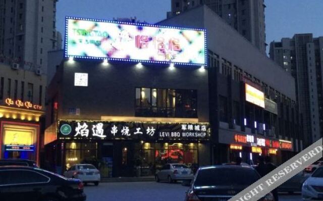 QiaQia Themed Express Hotel (Tianjin Jintang Highway)
