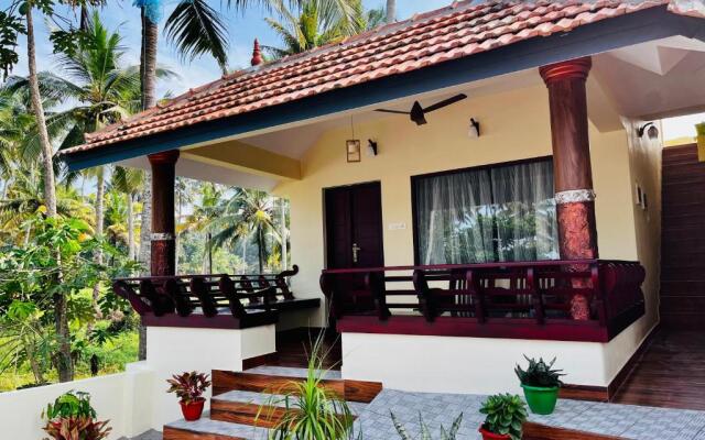 Maadathil Cottages