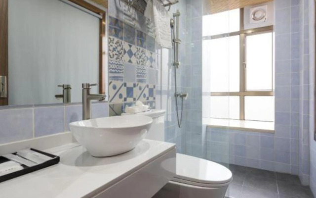 Guangzhou Hanguan Four Seasons Apartment (Guangzhou Baiyun Airport Qingtang Subway Station)