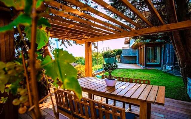 Family suite with garden and amaizing view to Lugano