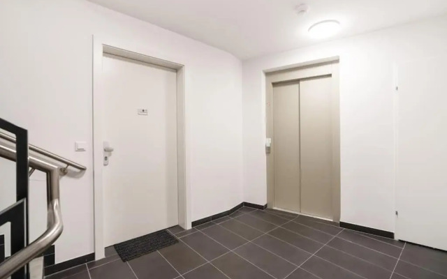 Grüne und zentrale Ruhelage im Neubau mit Balkon