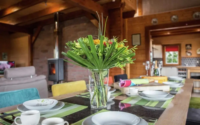 Affluent Chalet in Septon with Whirlpool, Sauna, Hot Tub