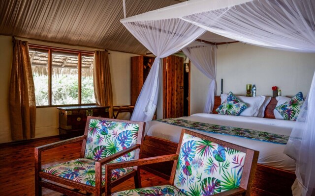 Saadani Safari Lodge - bush, river, beach