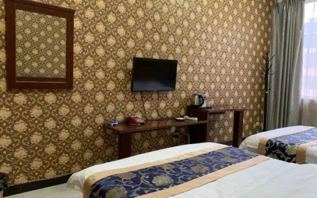 Qujing Ruixin Business Hotel