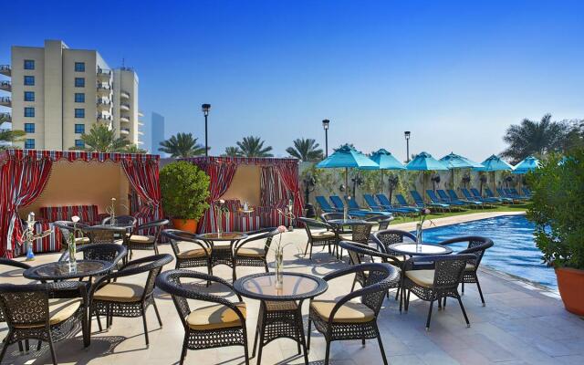 Отель Arabian Park Dubai, an Edge by Rotana Hotel