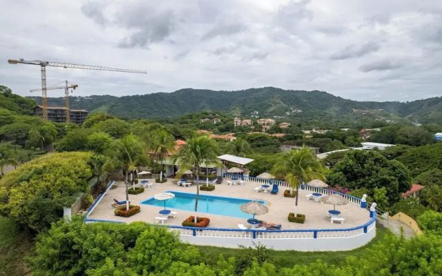 Modern Top-Floor Condo with Panoramic Views and Community Pool