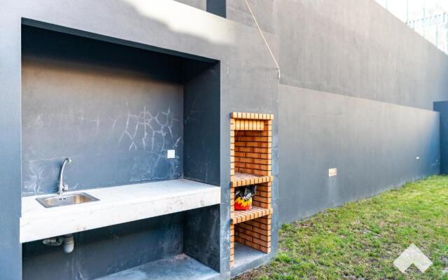 Light-Filled Apartment with Garden • Downtown