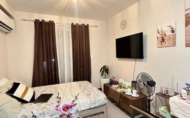 Studio Retreat with Balcony and Pool